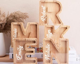 Kundenspezifische Anfangsmünzenbank, personalisiertes hölzernes Buchstaben-Sparschwein
