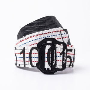 May include: A white and black belt with red and blue stripes and the text "Flybooster" printed on it. The belt has a black buckle.