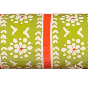 May include: A rolling pin with wooden handles and a patterned center. The center features a green background with white floral and arrow designs, accented by red stripes. A kitchen tool for baking.