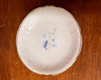 Crazed and Stained Butter Pat with Small Blue Flowers Gold Trim with Debossed Scalloped Ribbon