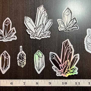 Holographic crystal stickers for laptop, waterbottle, school supplies, and more.