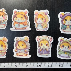 Stickers of cute hamsters wearing hoodie