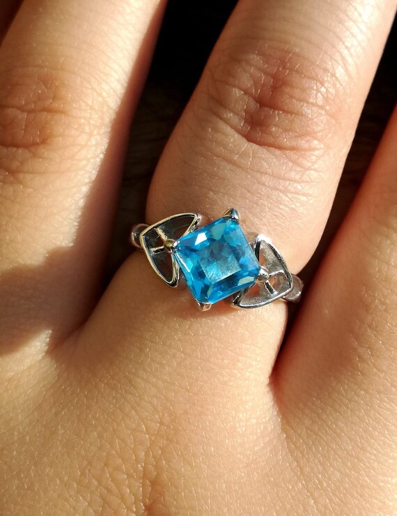 Blue topaz solitaire engagement ring sale