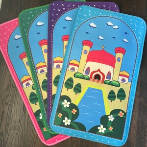 May include: Four colorful prayer mats with a mosque design. Each mat features a different border color: pink, green, purple, and blue. The mats have a blue sky background with clouds and musical notes.