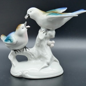 Vintage mid century ceramic birds made in Germany with makers stamp.