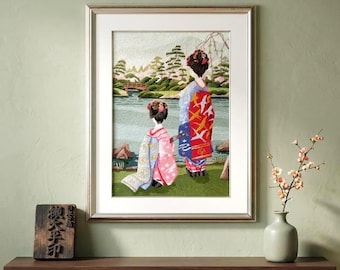 May include: A framed embroidery artwork depicting two figures in traditional Japanese clothing standing by a lake with a red bridge, pine trees, and mountains in the background. The taller figure wears a red and blue kimono with crane patterns.
