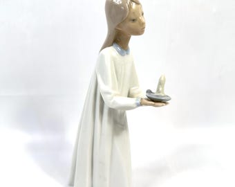 Nao porcelain girl figurine holding candle, spain
