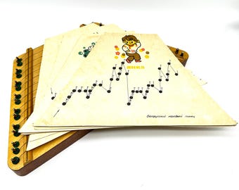 Zither lap harp, “perepelochka”, wooden string instrument with music sheets, mid-century