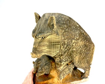 Wooden boar with piglets – hand-carved ainu folk art sculpture, japan