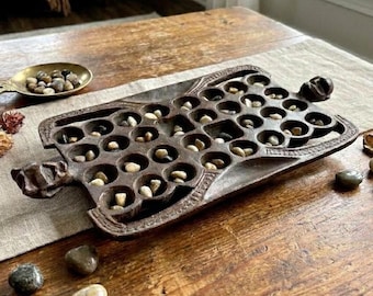 Mancala-bordhout, 32 pits, handgesneden Afrikaans bao-steenspel