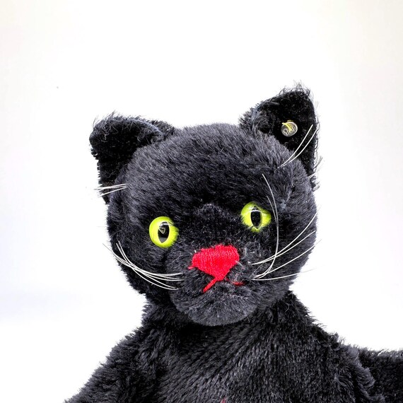 シュタイフのボタン付き黒猫のハンドパペット – モヘアのぬいぐるみ