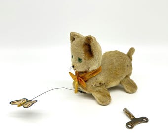 Vintage japanese wind-up cat toy, 1940s mechanical plush with butterfly