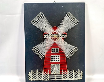 String art windmill wall hanging, pin and thread folk decor, 1970s