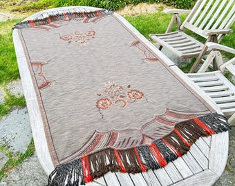 Hand-embroidered tablecloth – floral folk textile with fringe
