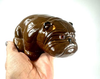 Ceramic bulldog figurine – mid-century pottery dog, brown glaze, glass eyes