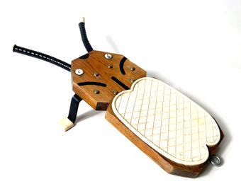 Vintage svensk stöveljacka, Eric Dalmas skodragare, insektsdesign