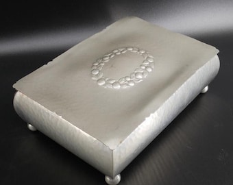 Pewter jewellery box with garland design and wood interior, 1940s