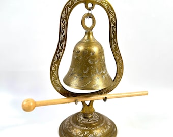 Vintage engraved brass bell with stand and wooden striker