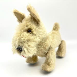 ヴィンテージのブリキ製ぬいぐるみ犬、車輪付き、1960年代、ギリシャ