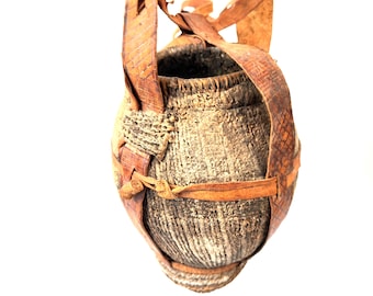Tribal Water Vessel – Woven & Mud-Coated Jug with Leather Strap