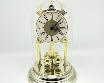 Vintage 1990s Haller Germany Quartz Anniversary Clock with Rotating Pendulum Glass Doomed