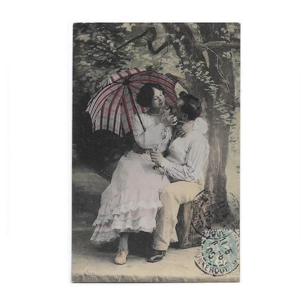 Colorized Vintage Couple Hand Tinted French Photo Postcard, Girl with a Parasol sitting on a Man's lap in the park