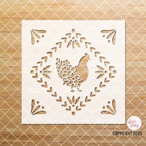 May include: A square stencil featuring a chicken design with floral details. The chicken is inside a diamond-shaped frame with decorative elements. The stencil is white and set against a wood grain background. Text on the image reads "COPYRIGHT 2025".