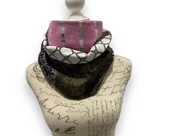 Infinity scarf, fir trees on a pink background