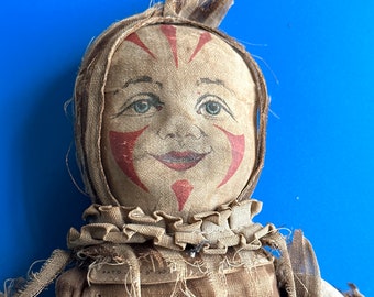 Insolite, ancien corps de poupée en sciure de bois, 19 e s. en tissu à imprimé clown en tissu