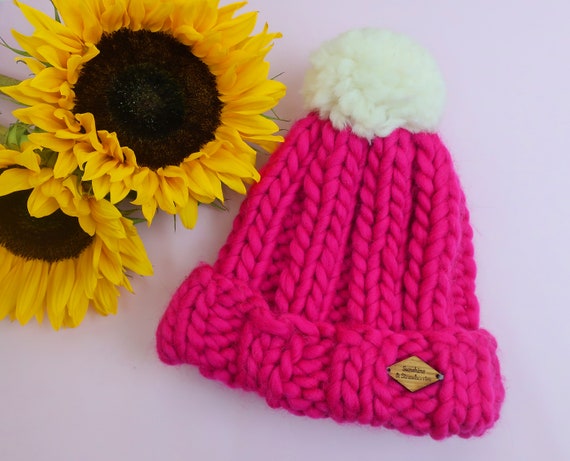 pink bobble hat baby