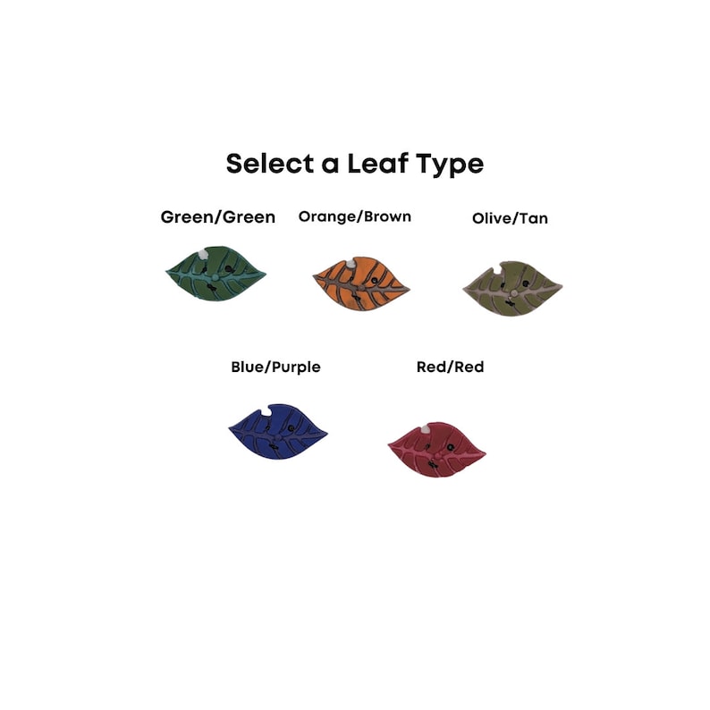 May include: Five different colored leaf-shaped buttons with a cartoon face on each. The colors are green, orange, olive, blue, and red.