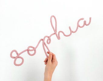 Handmade and customized knitted wire name sign for bedroom, office, and playroom. Trendy wall decor