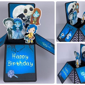 May include: A pop-up birthday card with a black and blue color scheme. The card features characters from the Nightmare Before Christmas and Coraline. The card is open and the pop-up features Jack Skellington, Sally, Coraline, and other characters. The card has the words 'Happy Birthday' on the front and inside.