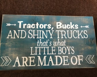 Tractors,Bucks and shiny trucks for little biys room , a nursery, playroom , garage, club house