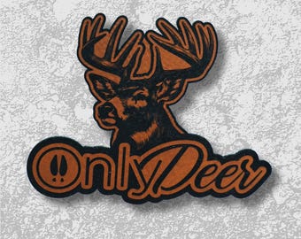 May include: A brown and black deer head logo with the text "Only Deer". The logo features a detailed illustration of a deer's head with large antlers. The text is in a stylized font.