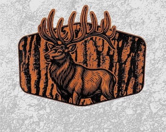 May include: An orange and black graphic of a majestic elk with large antlers, set against a textured tree bark background. The elk is facing left, with detailed linework. The image is in a hexagonal shape. The bottom of the image has the text "FAST SHIPPING - MORE COLOR OPTIONS".