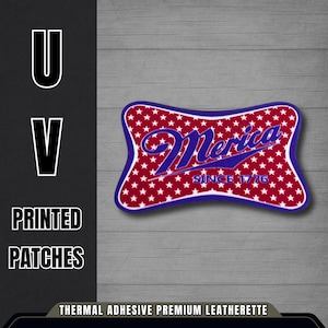 May include: A red, white, and blue patch with the word "Merica" in a cursive font, surrounded by white stars. The patch has a blue border and the text "SINCE 1776". The patch is a thermal adhesive premium leatherette.