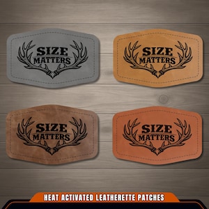 May include: Four rectangular patches with rounded corners in gray, tan, brown, and orange. Each patch features a black graphic of deer antlers framing the text "SIZE MATTERS" in a bold, serif font. The bottom banner displays the text "HEAT ACTIVATED LEATHERETTE PATCHES".