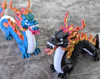 Ornamento di drago lucido stampato in 3D con effetti bicolore
