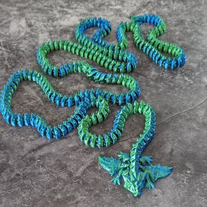 Articulated Long-tailed Winged Crystal Dragon. Large high quality 3D printed fidget / anxiety toy / ornament / sculpture Emerald / Sapphire