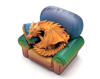 Figurina: Drago che sonnecchia su una comoda sedia