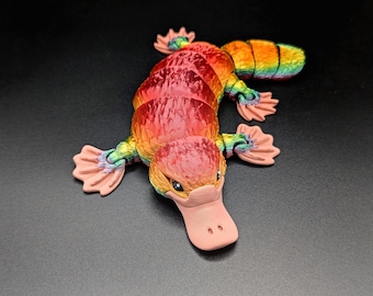 Ornitorinco arcobaleno articolato. Giocattolo colorato anti-ansia / giocattolo decorativo / scultura