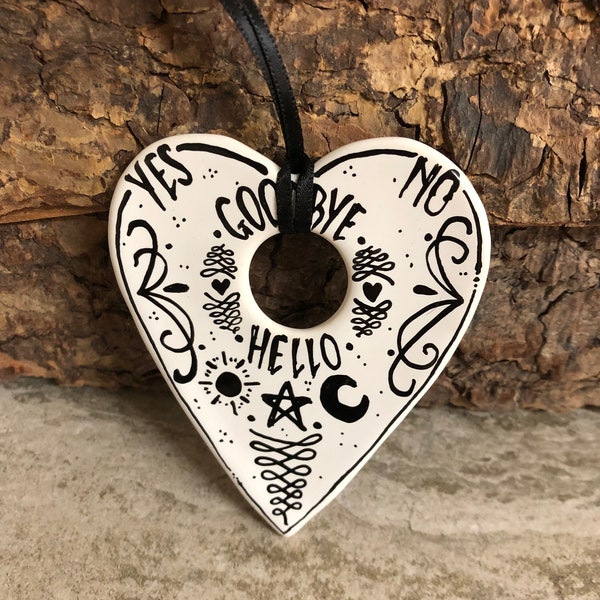 Handmade ceramic planchette decoration