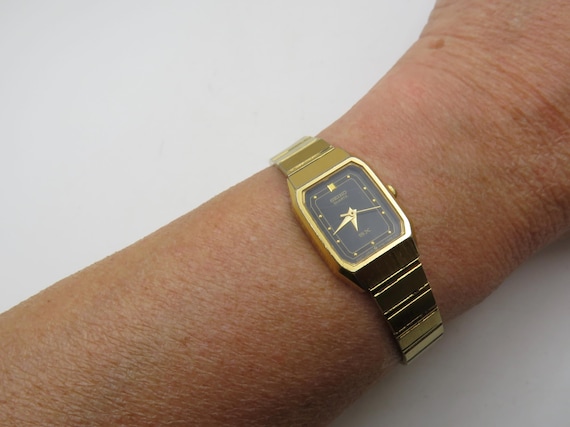 vintage seiko sx wrist watch / rectangle gold watch / adjustable wrist size / vintage gift / watch / ladies watch (w11)