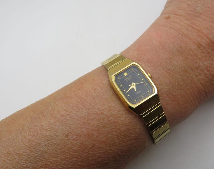 vintage seiko sx wrist watch / rectangle gold watch / adjustable wrist size / vintage gift / watch / ladies watch (w11)