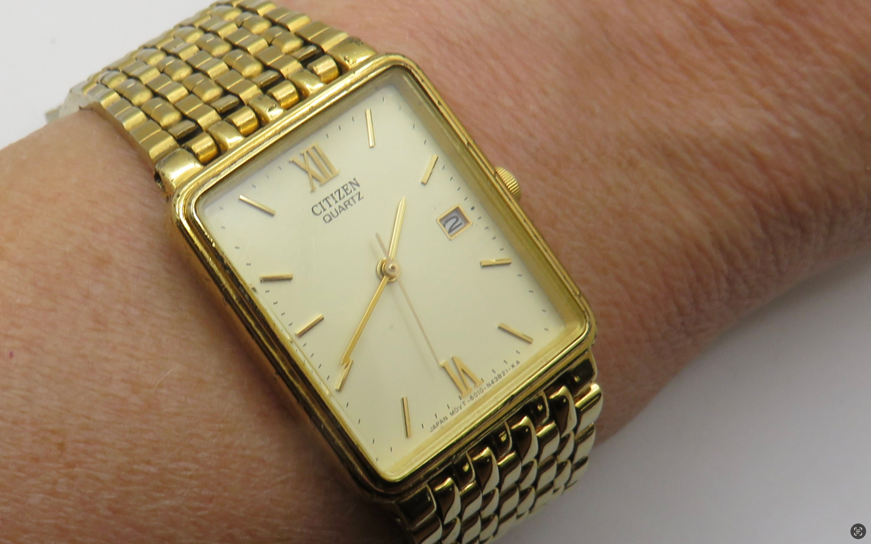 Citizen rectangular gold watch clearance