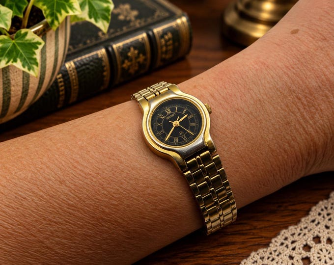 Vintage Seiko Ladies Gold Watch, Black Dial, Adjustable Bracelet w18