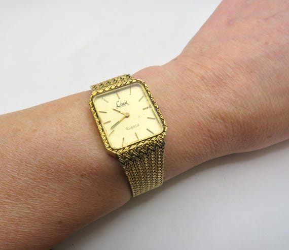 Vintage rectangle watch / tank Watch 8" wrist max  / gold watch / quartz watch / Vintage Limit Watch / M2