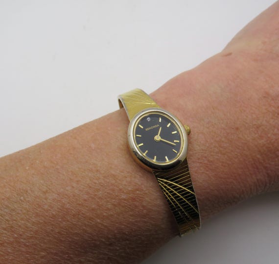 Vintage wrist watch / womans diamond black dial watch /  vintage sekonda watch /  oval watch / ladies watch (t12)