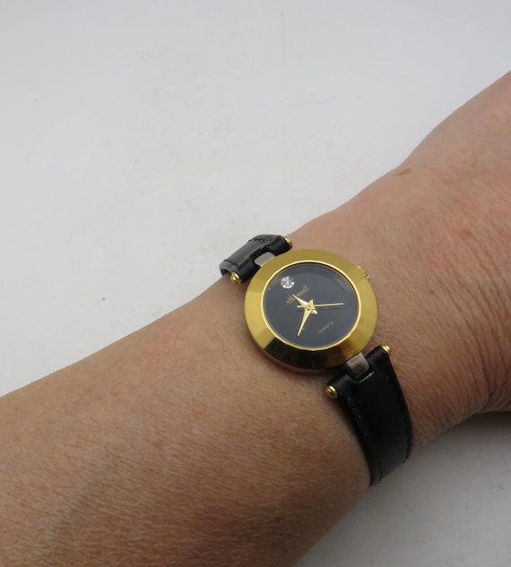 Vintage diamond watch, Gold plate Finish, black dial Leather Strap (s14)